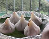 A picture of step 6 of Ukdiche Modak.
