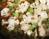 A picture of step 4 of Fulkobichi Rassa Bhaji (cauliflower curry).