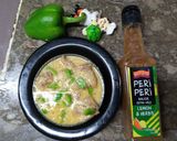 A picture of step 4 of Peri lemon karahi.