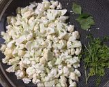 A picture of step 1 of Cauliflower sabzi (Satvik).