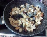 Foto del paso 3 de la receta Rissoto de boletus y gambas con un toque de ajo negro 