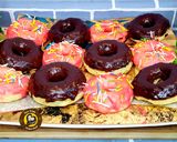 A picture of step 7 of No knead baked donuts with 2 different glaze.
