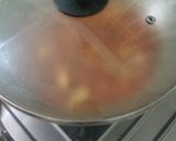 A picture of step 4 of Panch foran potato curry.