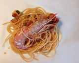 A picture of step 4 of Spaghetti ai frutti di mare al cartoccio.