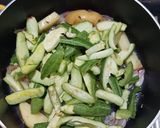 A picture of step 2 of Burnt Masala Parwal.