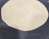 A picture of step 1 of Cheese Schezwan Pizza Frankie.