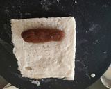A picture of step 4 of Znoud-el-sit with creamy choco hummus filling and red grape sauce.