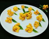 A picture of step 19 of Khasta flower mathri.