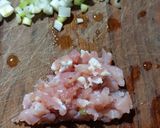 A picture of step 2 of "loaded" stuffed potato skins.