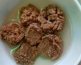 A picture of step 2 of Baigun bodi(brinjal in dried lentil dumplings).