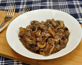 Foto del paso 3 de la receta: Champiñones encebollados en cerveza negra
