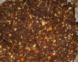 A picture of step 4 of Til and peanuts date roll.