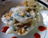 A picture of step 4 of Baked shell pasta stuffed with creamy sauce.