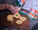 A picture of step 6 of Kesariya tri-colour mawa roll.