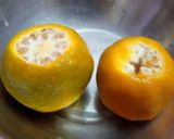 A picture of step 2 of Orange wedges icecream.