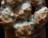 Foto del paso 2 de la receta: Papas rellenas de panceta y Cheddar gratinadas con bolognesa 🥔