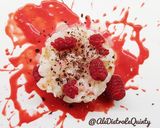 Foto del passaggio 4 della ricetta Tartare di gamberi con coulis di lamponi e scaglie di cioccolato