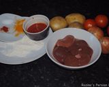 A picture of step 21 of Persian lamb kidneys with tomato sauce.