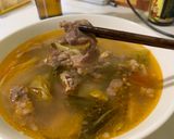 Hình bước làm 4 của món Canh bò hầm dưa chua