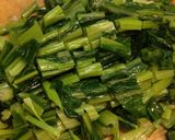 A picture of step 2 of Turnip Greens Salad with Toasted Sunflower Seeds.