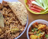 A picture of step 11 of Sindhi Pulav Gobhi Aloo.