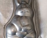 A picture of step 9 of Easter Bunny Chocolate Cake.