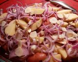 Foto del paso 7 de la receta Patatas orgánicas al horno con cebolla roja y pinchos morunos