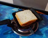 A picture of step 6 of Cheesy Chicken Salami Sandwiches.
