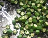 A picture of step 1 of Masala bhindi aaloo.
