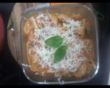 A picture of step 4 of Green and pink sauce backed pasta.