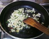 A picture of step 1 of Tadka Curd Curry.