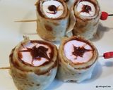 Une image de l'étape 3 de Yeux de monstre pour Halloween en crêpes roulées.