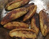 A picture of step 9 of Besan stuffed karela(bitter gourds).