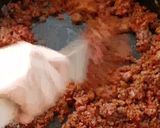 A picture of step 4 of Baked Mince and Spinach Eggs.