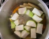 Hình bước làm 4 của món Canh tôm tươi hạt sen bắp non carrot bí đao