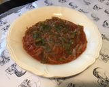 Une image de l'étape 13 de Oignons de roscoff aux tomates,poivron vert,épices et origan.