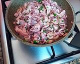 Foto del paso 3 de la receta: Chipirones frescos rellenos en salsa de cebolla y tikka curry