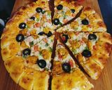 A picture of step 8 of Cheesy Bites Tikka Pizza 🍕🍕.