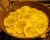 A picture of step 4 of Ravioli (cheese and spinach stuffed Ravioli) Mushroom cream sauce.