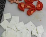 Foto del paso 5 de la receta: Pizza de tortilla con salchicha, jamón, queso y tomate