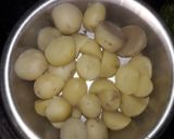 A picture of step 1 of Dum aloo.