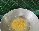 A picture of step 2 of Pumpkin Saag(kumro) with Moong dal and Coconut.