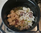 A picture of step 2 of Brothy rice with prawns and squid.