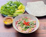 Hình bước làm 7 của món Mực Hấp Cuốn Bánh Tráng Rau Muống