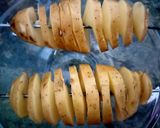 A picture of step 1 of Tornado Potatoes.