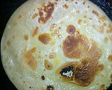A picture of step 4 of Soft chapati served with beans.