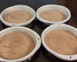 A picture of step 8 of Chocolate Layer Cake with Strawberry Cream Filling, White Chocolate Ganache Frosting coated with a Chocolate Crumble.
