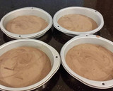 A picture of step 8 of Chocolate Layer Cake with Strawberry Cream Filling, White Chocolate Ganache Frosting coated with a Chocolate Crumble.