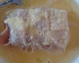 A picture of step 2 of Deep fried bacon wrapped cod.