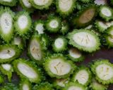 A picture of step 1 of Khatta Mitha Karela.